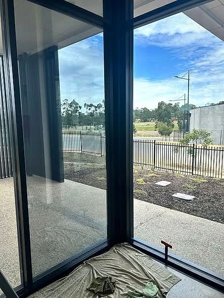View out through freshly tinted floor to ceiling home windows, glare reduced