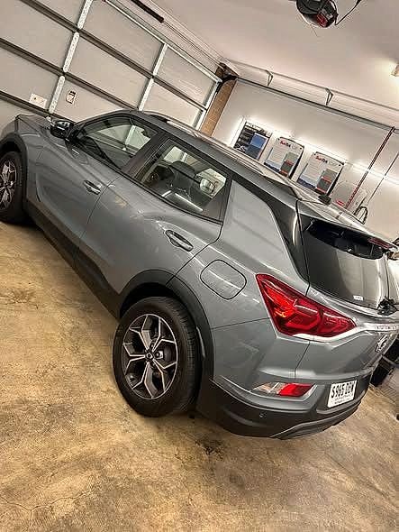 A grey SsangYong tinted in the workshop